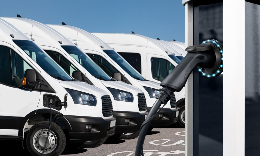 Electric vans plugged in charging