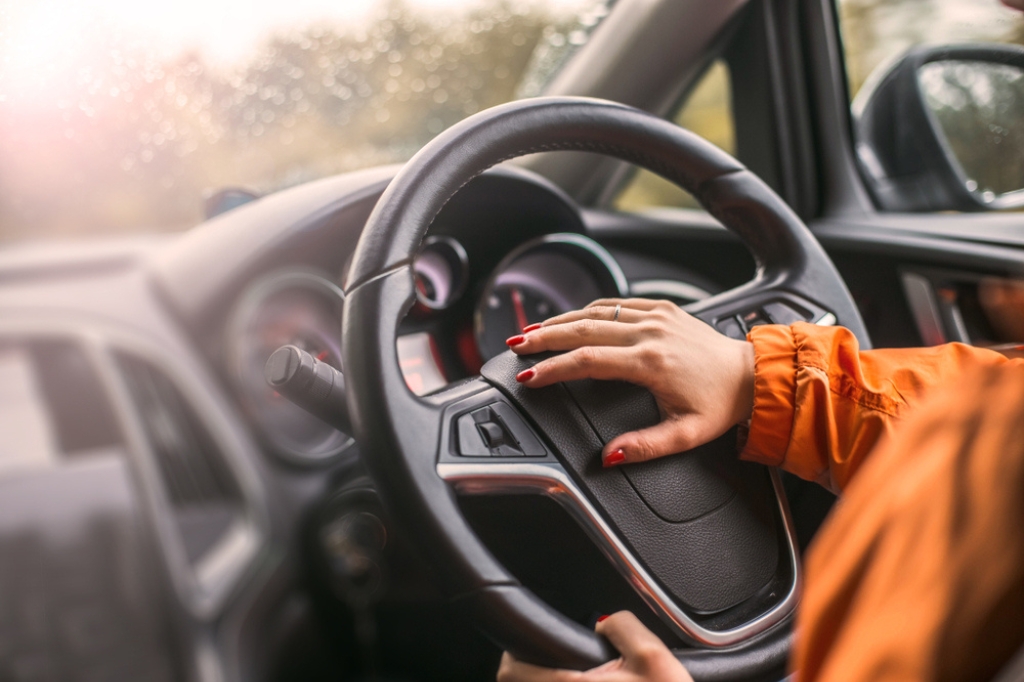 A woman driving her salary sacrifice car.